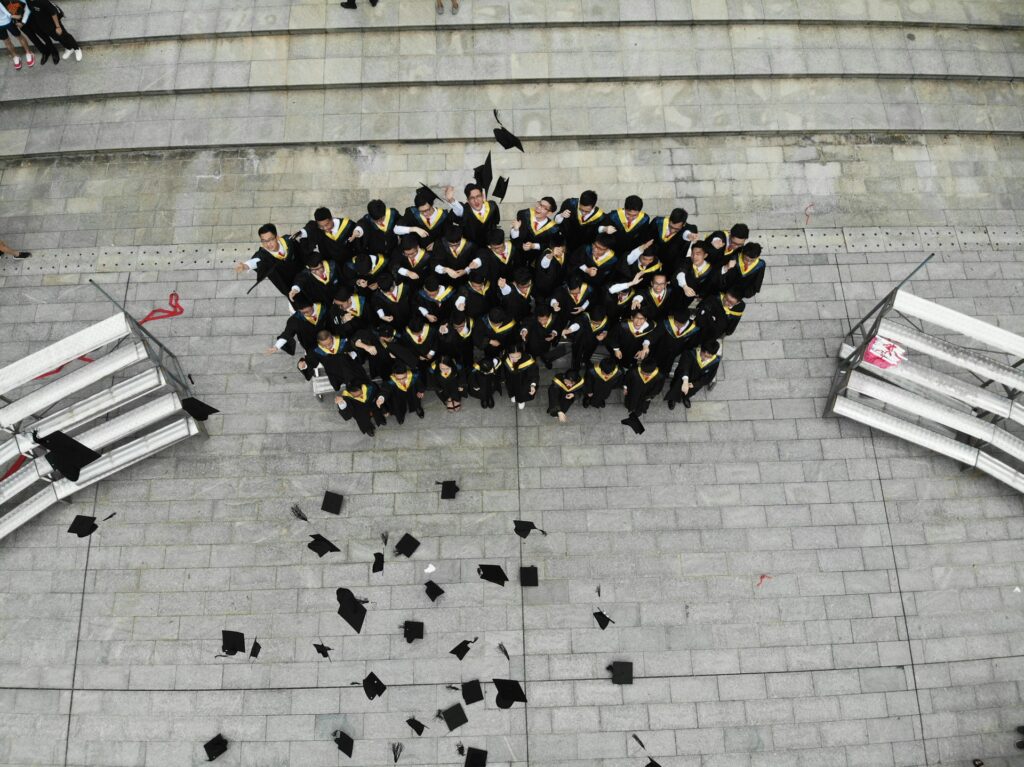 Graduates throwing their caps in the air