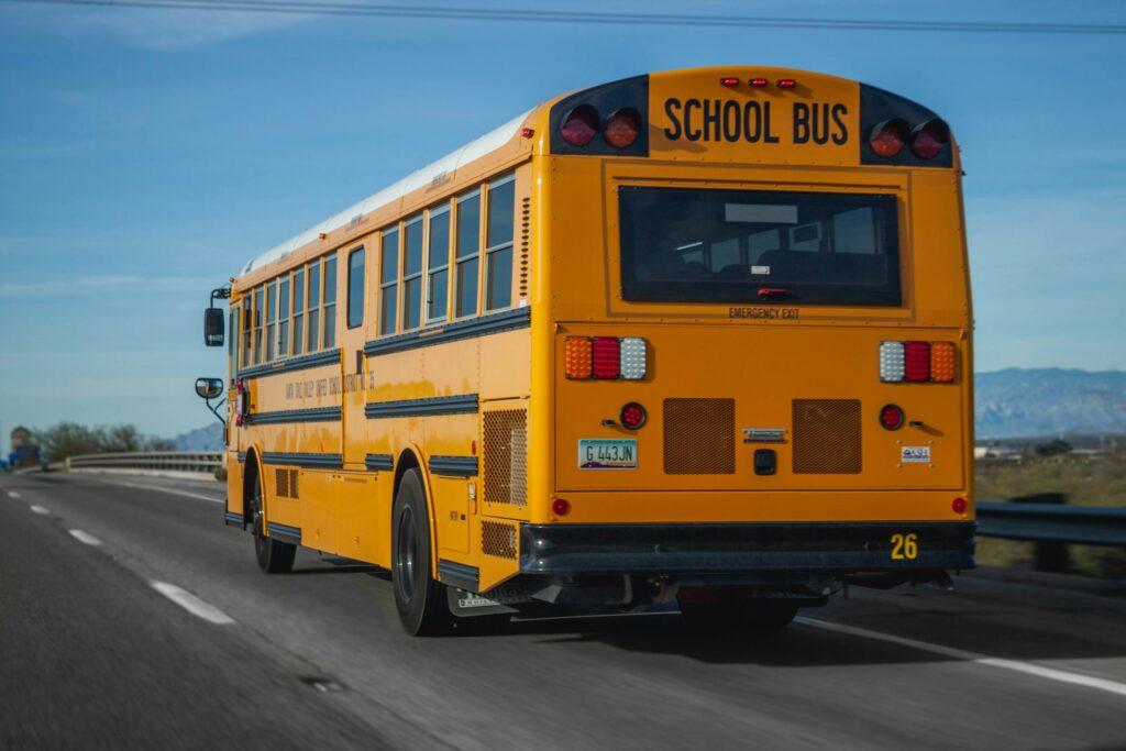 A yellow school bus on the road